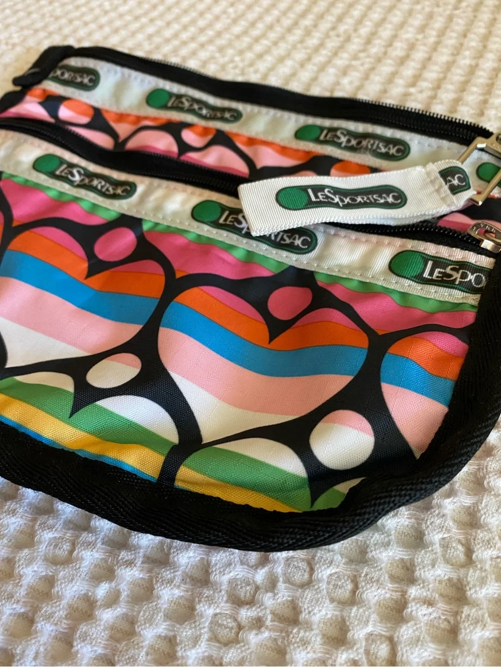 LESPORTSAC 2-Tiered Zip Bag in Vibrant Striped Hearts
